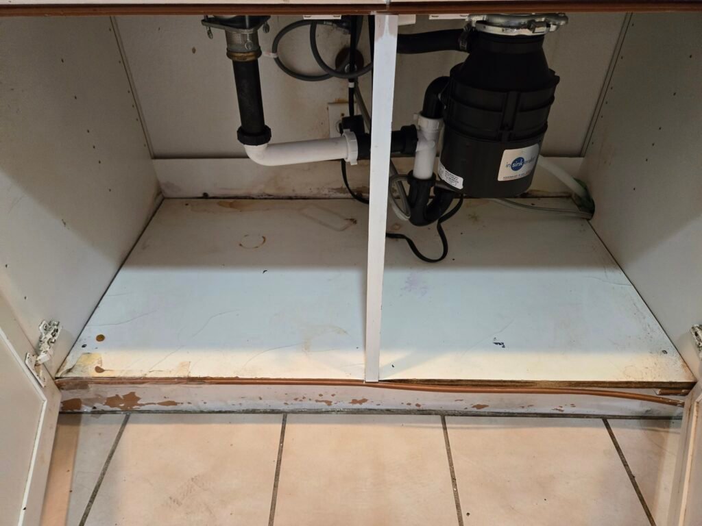 water damage under sink